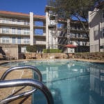 This ia a photo of the pool area at Princeton Court Apartments in Dallas, TX.